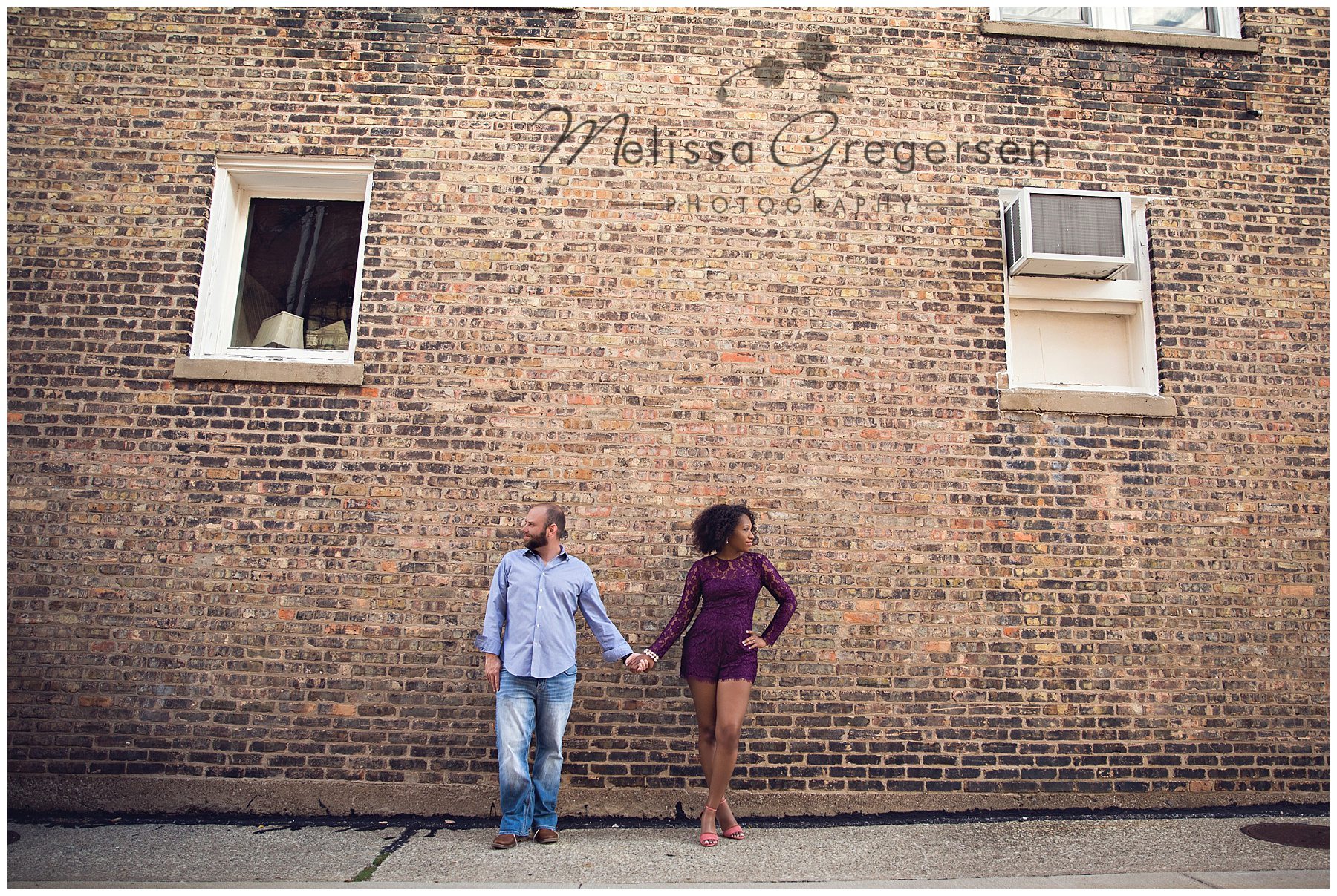 Gorgeous engagement photos with textured brick wall in St. Joseph Michigan